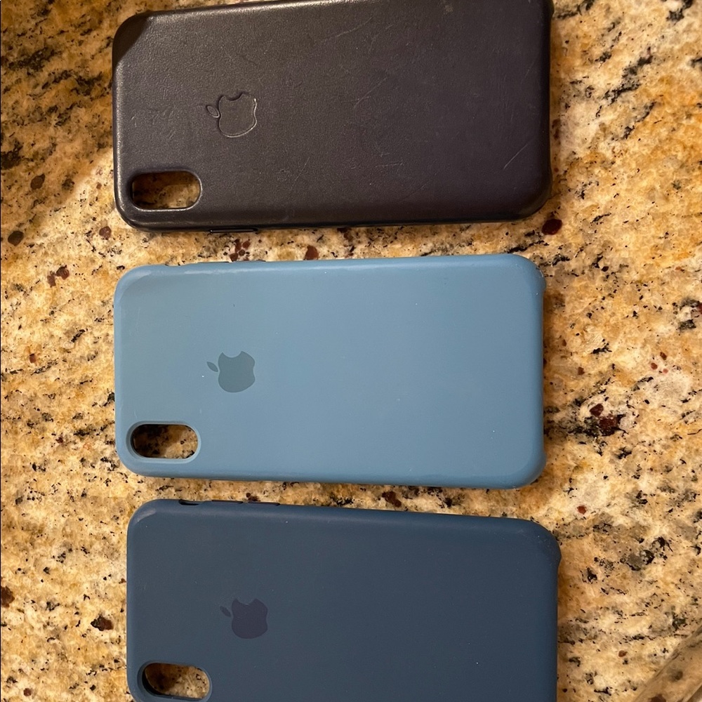 Three Apple iPhone 12 Apple cases.